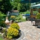 paver patio with lush landscaping - Spade Landscaping patio design