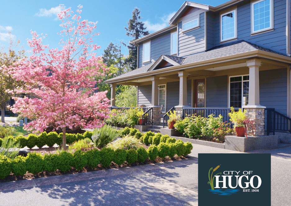 exterior of a suburban home with green plants - Spade Landscaping Landscaping Hugo MN