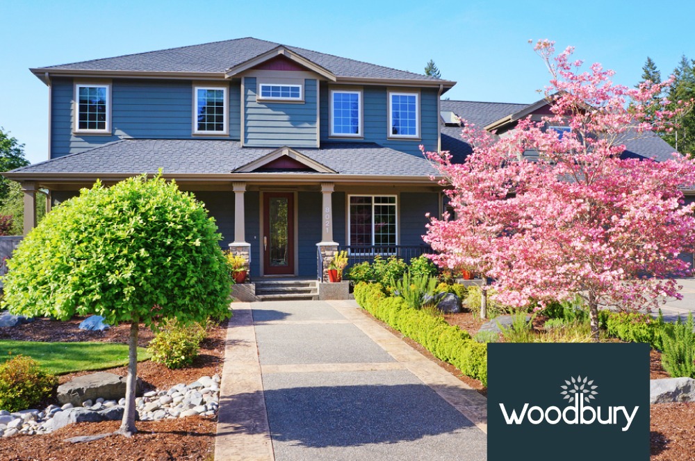 exterior of a suburban home with green grass - Spade Landscaping Landscaping Woodbury MN