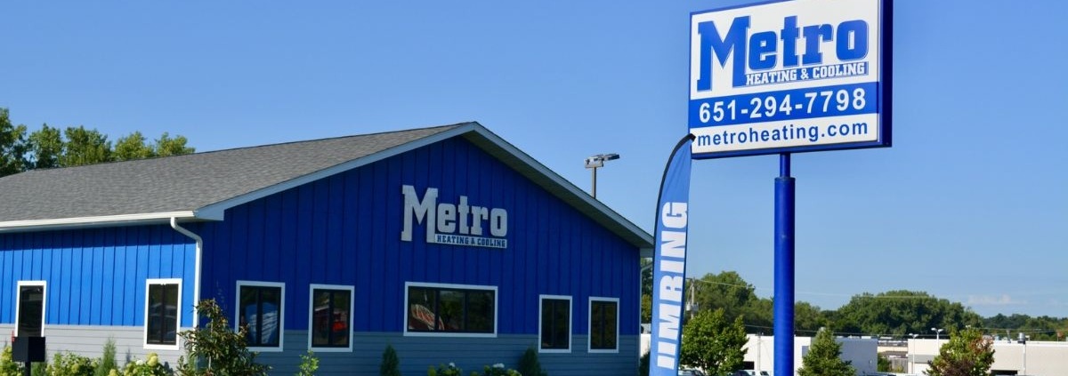 freshly mowed grass outside a commercial building - Spade Landscaping commercial landscaping services