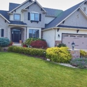 freshly mowed grass outside a house - Spade Landscaping residential landscaping services