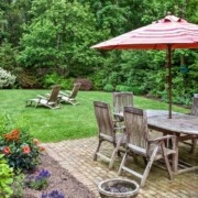 backyard with a patio and green grass - Spade Landscaping Lawn Care Services Near Hugo MN