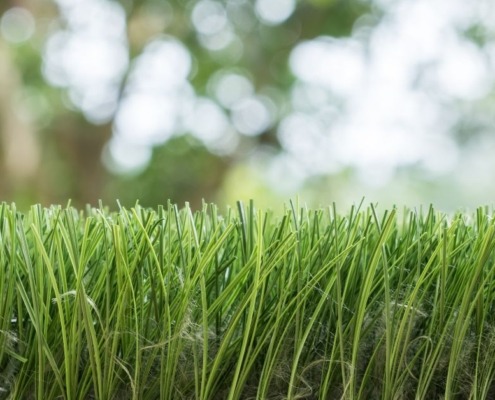 close up of green synthetic turf - Spade Landscaping synthetic turf